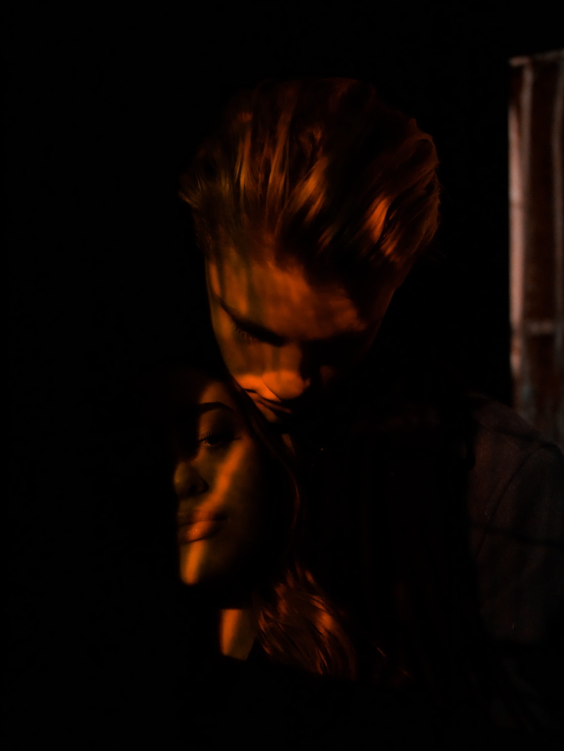 dark, hairstyle, leisure activities, flare, beautiful woman, blurred motion, crypt, young adult, lifestyles, headshot, flame, light, 4K, black background