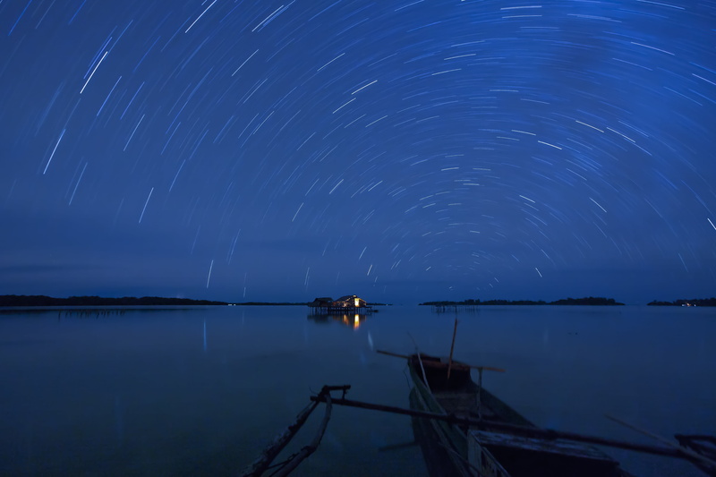 space, star field, lagoon, star, outdoors, mode of transportation, night view, no people, long exposure, widi islands, beauty in nature, tranquil scene