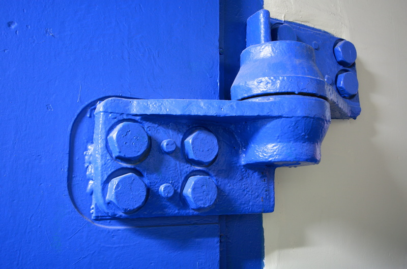 sign, door hinge, wall - building feature, outdoors, power plant, blue, text, communication, technology, germany, concrete, no people, mailbox, connection
