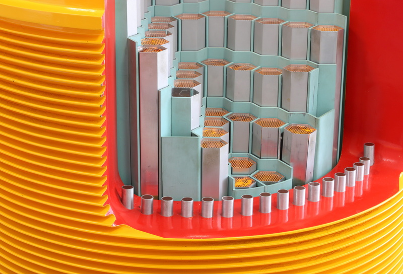 castor, multi colored, in a row, reactor, indoors, storage, no people, fuel rod, power plant, yellow, choice, table, waste, 5K, model, visitor center