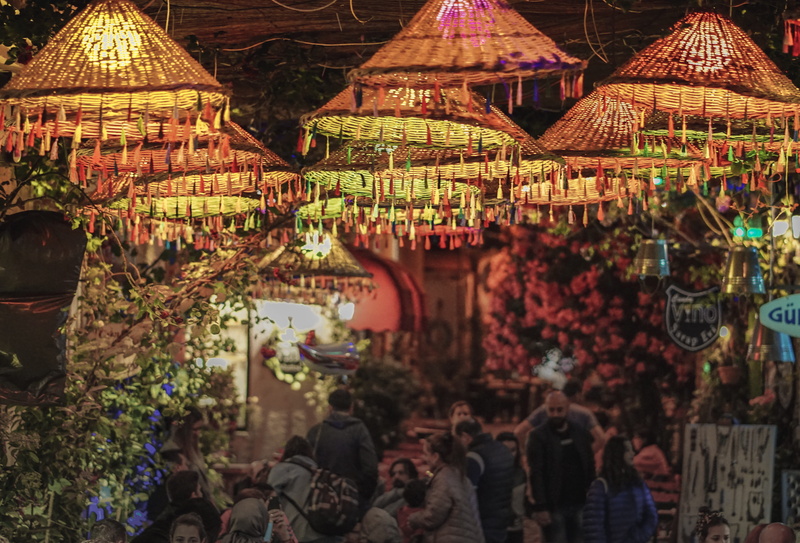 group of people, human, architecture, lighting, restaurant, night, pendant, market stall, retail display, men, retail, choice, bazaar, 5K, outdoors, variation