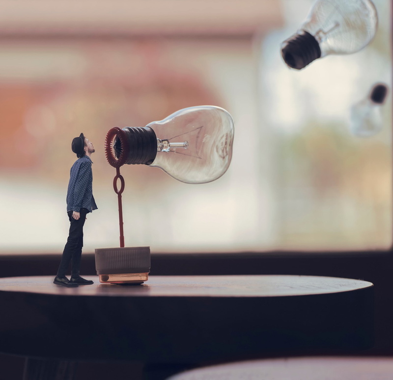 business, selective focus, 1080P, day, holding, adult, standing, digital art, occupation, real people, casual clothing, technology, lightbulb, bottle