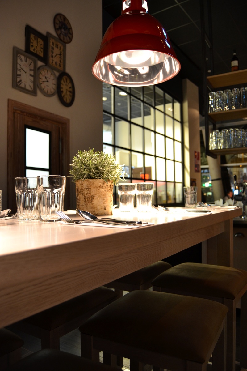 food and drink, industry window, pendant light, industrial design, business, interior, absence, ceiling, place setting, seat, dynamics, no people, setting
