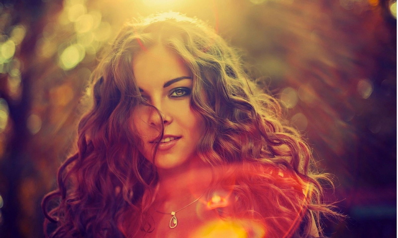 woman, hair, teenager, beauty, girl, women, adult, contemplation, flowers, smiling, curly hair, headshot, lights, pendant, young adult, looking at camera