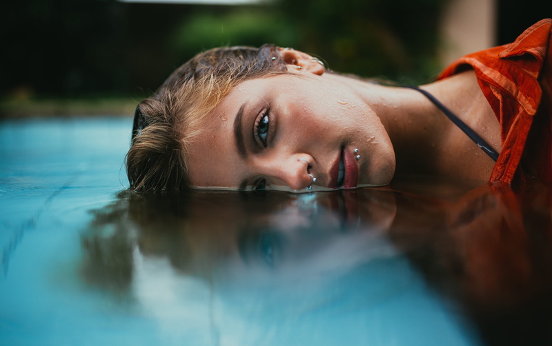 woman, nose ring, pretty, headshot, day, outdoors, swimming pool, water, portrait, pool, selective focus, head, young adult, nose piercing, blur, beautiful