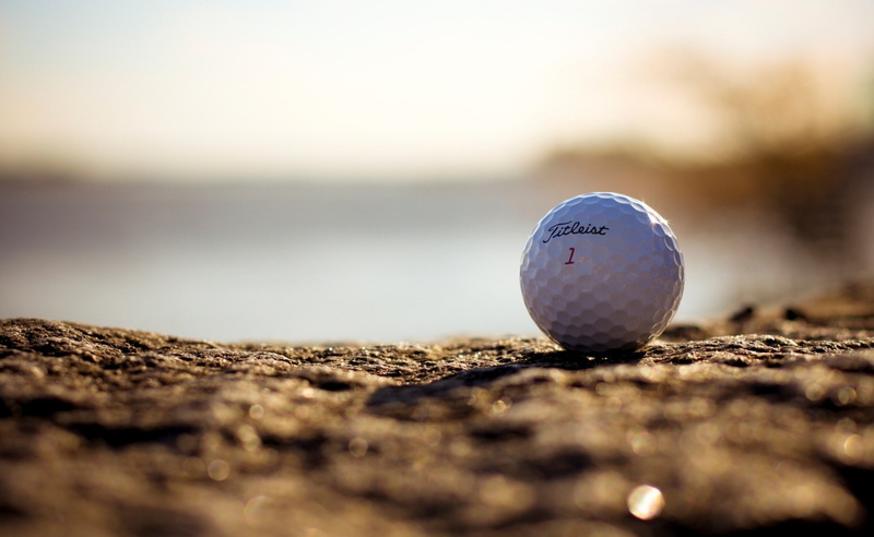 titleist, sphere, sport, sand, nature, surface level, Sports, golf ball, no people, 2K, close-up, sky, day, golf course, circle, single object, selective focus