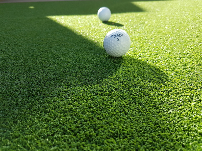 golf course, close to, putting green, at the edge of, ball, competition, two, sport, 4K, no people, white, day, golf ball, green, grass, close-up, shadow