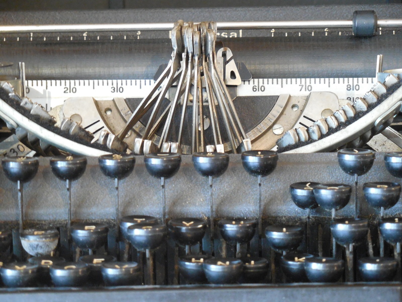 silver colored, musical instrument, metal, music, order, communication, vintage typewriter, vintage type, indoors, typewriter, abundance, equipment, complexity