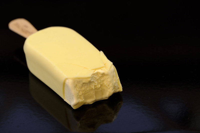 sweet dish, eat, black background, 5K, freshness, sweetness, chocolate, snack, single object, studio shot, luxury, dairy product, food, enjoy, yellow