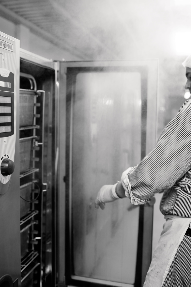 caterers, adult, large kitchen, food, human hand, lifestyles, one person, dish, business, steam, equipment, courts, appliance, gastronomy, smoke, eat, refrigerator