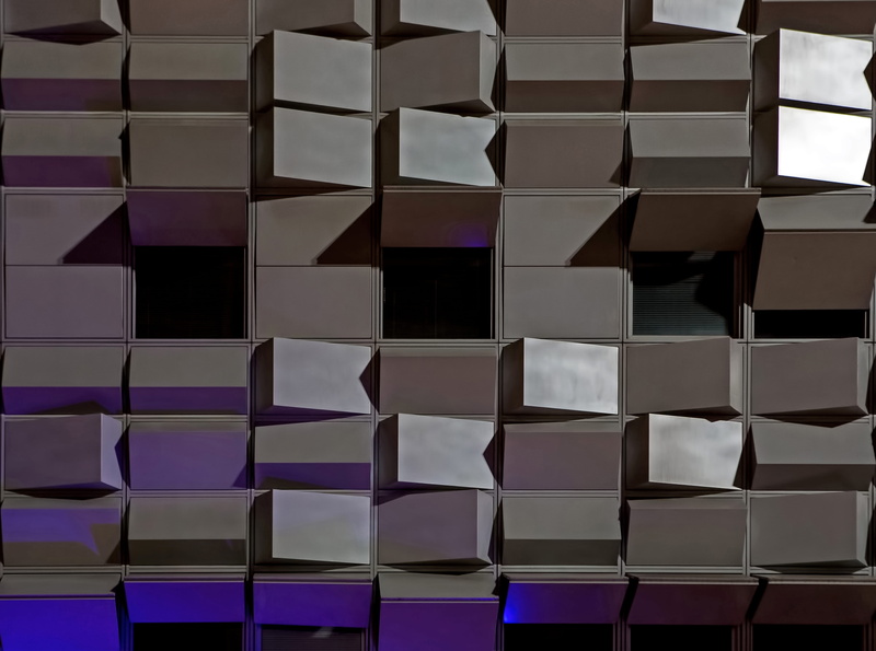 art and craft, repetition, wall - building feature, large group of objects, reflection, shape, architecture, multi colored, night, no people, wall, metal
