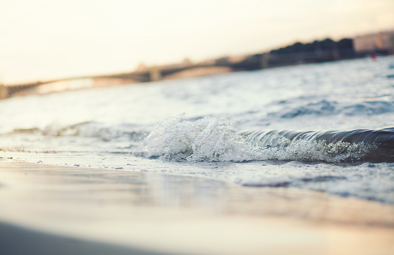 beauty in nature, depth of field, close-up, sunset, outdoors, sand, 5K, water, aquatic sport, selective focus, no people, power in nature, sea, surface level