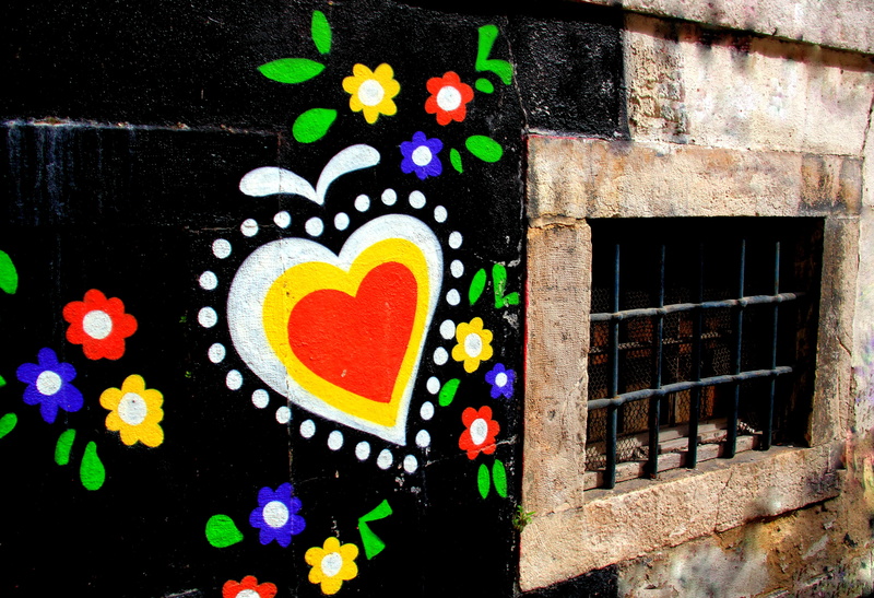 outdoors, multi colored, wall, love, flowers, prison, art and craft, celebration, inside, decoration, night, lighting equipment, illuminated, jail, window
