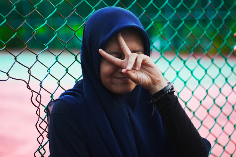 adolescence, islamic, woman, sport, peace, headscarf, fence, Asian, hood, portrait, 5K, guilt, real people, clothing, boundary, chainlink fence, wear