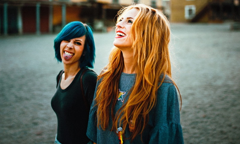 hairstyle, adult, model, architecture, brunette, long hair, people, tongues, dyed red hair, two people, happiness, young adult, smiling, positive emotion