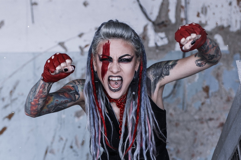 dark lipstick, pierced tongue, mascara, jewelry, necklace, lipstick, tattoo, long hair, open mouth, 2K, face paint, pierced lip, gloves, natural light