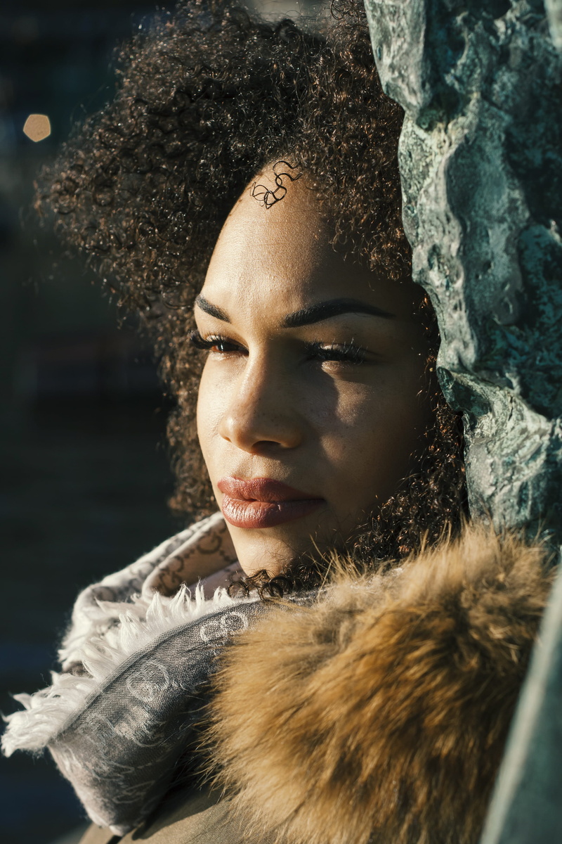 looking, lady, looking away, young, winter, photoshoot, fur, portrait, skin, one person, person, brown hair, clothing, curly hair, front view, hairstyle