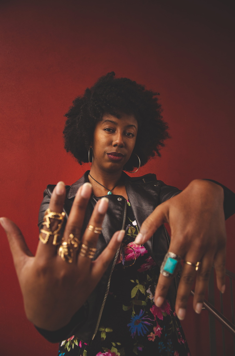 afro, arts culture and entertainment, wear, young adult, adult, women, waist up, jewelry, one person, hands, hairstyle, 4K, fashion, showing, front view