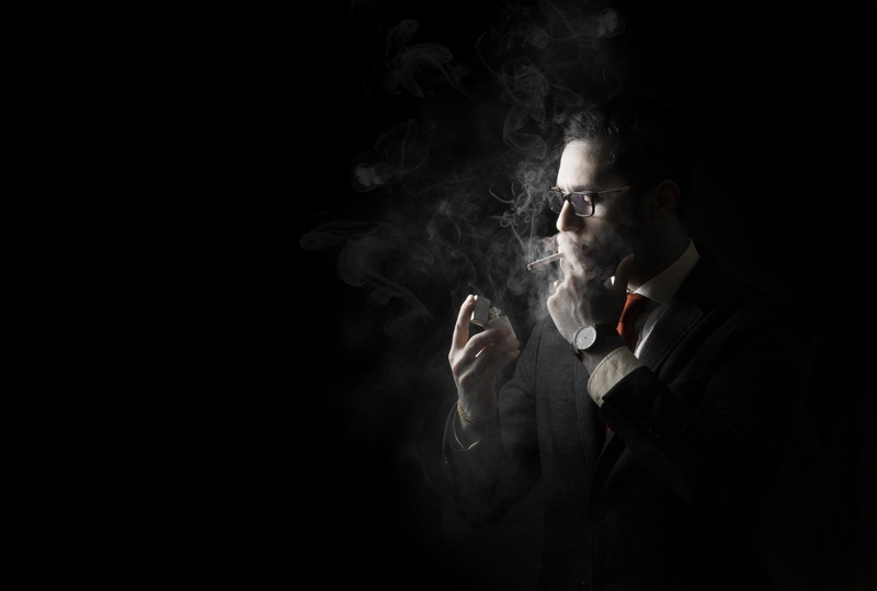 activity, social issues, contemplation, dark, indoors, men, adult, smoking - activity, smoking issues, suit, black background, studio shot, cigarette, tobacco product
