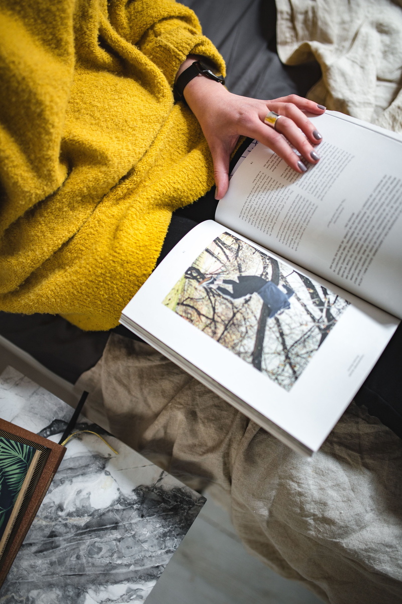 women, read, paper, human Hand, sweater, midsection, lifestyle, adults only, woman, real people, publication, time, casual clothing, female, woman reading