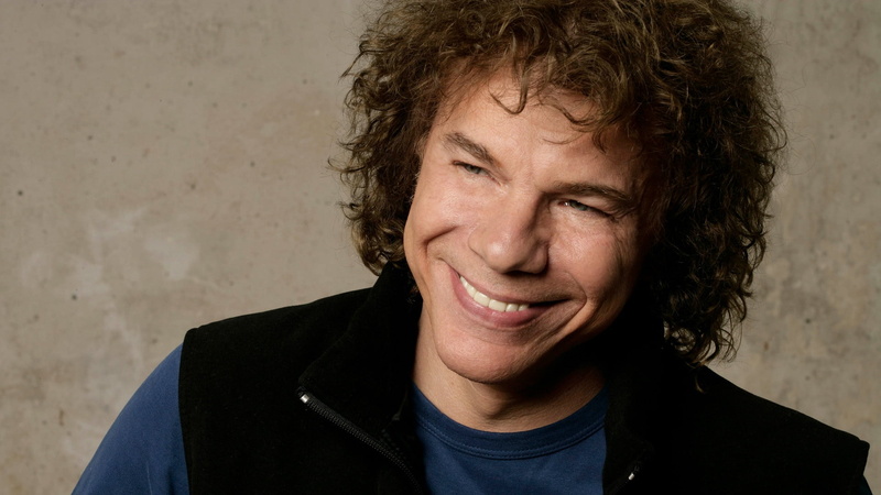 happiness, lifestyles, real People, color Image, hair, headshot, portrait, hairstyle, facial Expression, curly hair, people, smile, cheerful, riccardo cocciante