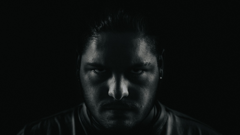 photo, front view, human face, looking at camera, one person, adult, face, serious, depression - sadness, portrait, negative emotion, emotion, grayscale