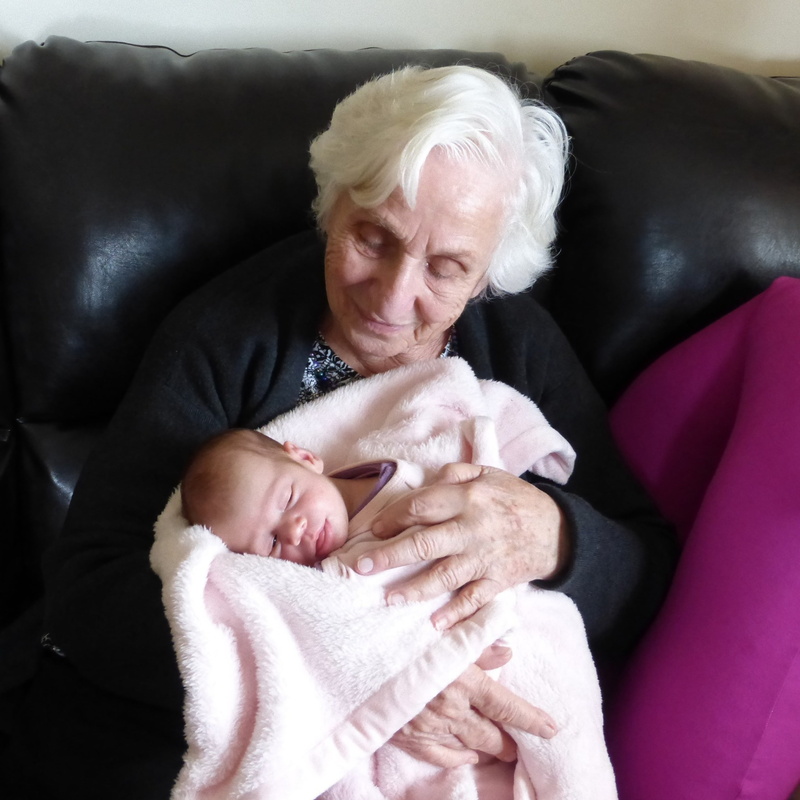 adult, cuddling, child, bonding, family, care, real people, relaxation, age, young, eyes closed, life, infant, senior Adult, innocence, black, love, cuddle