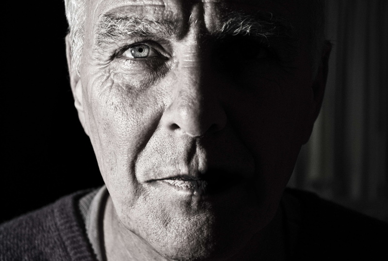 mature adult, mature men, body part, human body part, man, elder, looking at camera, portrait, men, males, black background, close-up, human face, studio shot