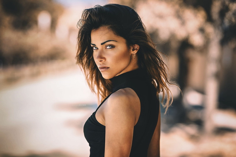 Marcello de Cenzo, standing, women, portrait, black clothing, looking over shoulder, one person, beautiful woman, young women, brown hair, dark eyes, long hair