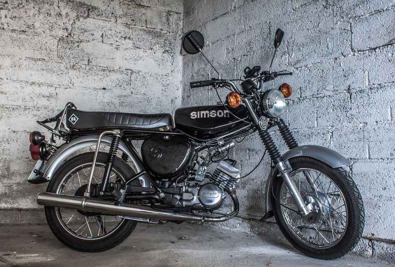 grey, bicycle, moped, wall, street, day, wheel, outdoors, stationary, transportation, travel, built structure, ostalgie, motorcycle, building exterior
