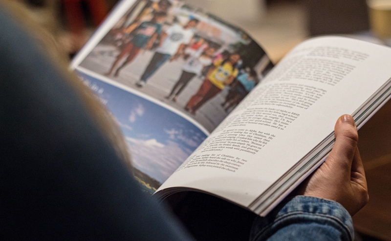 selective focus, personal perspective, read, learning, blue, the media, magazine, open, indoors, reading, book, education, newspaper, denim, publication