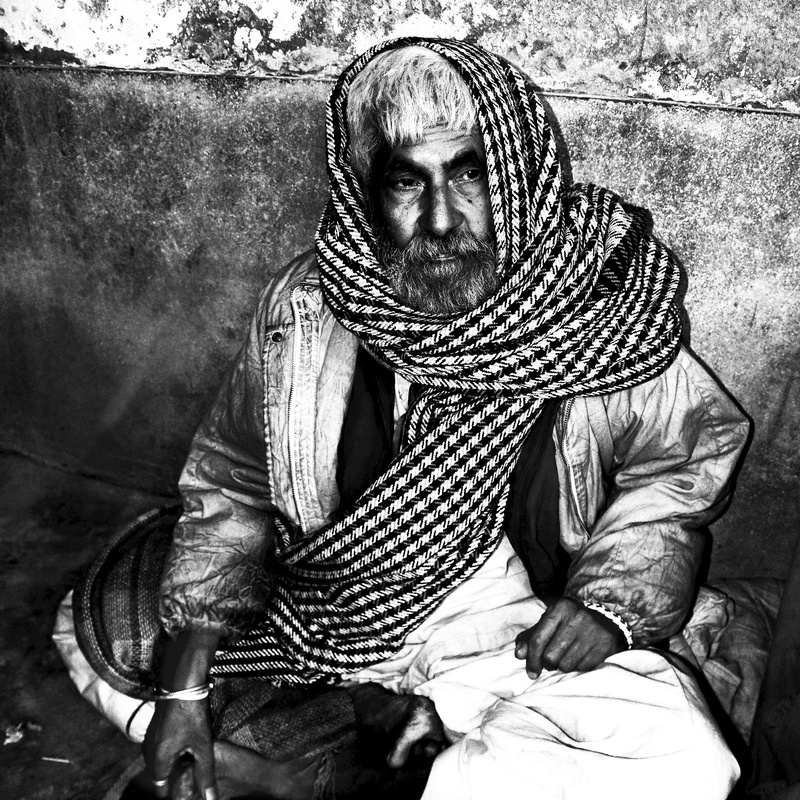 day, mature adult, homeless, three quarter length, looking at camera, one person, senior adult, beggar, sitting, men, full length, adult, front view, leisure activity