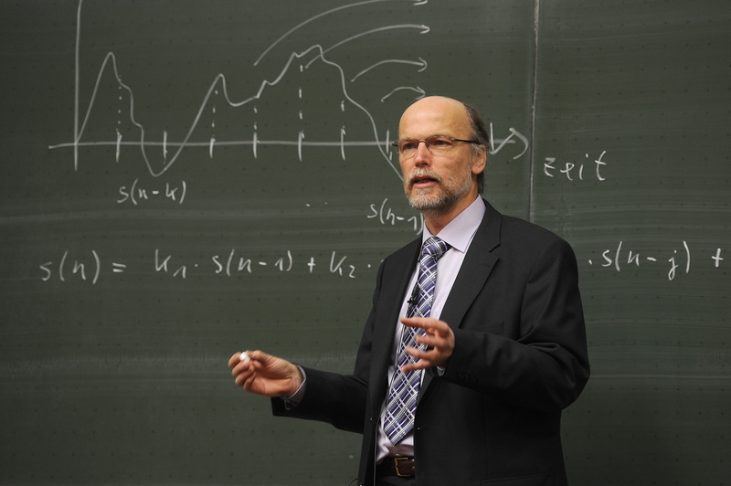 professor, 4K, one person, university, man, lecturer, suit, mature adult, waist up, occupation, learning, men, formula, teacher, front view, school, standing