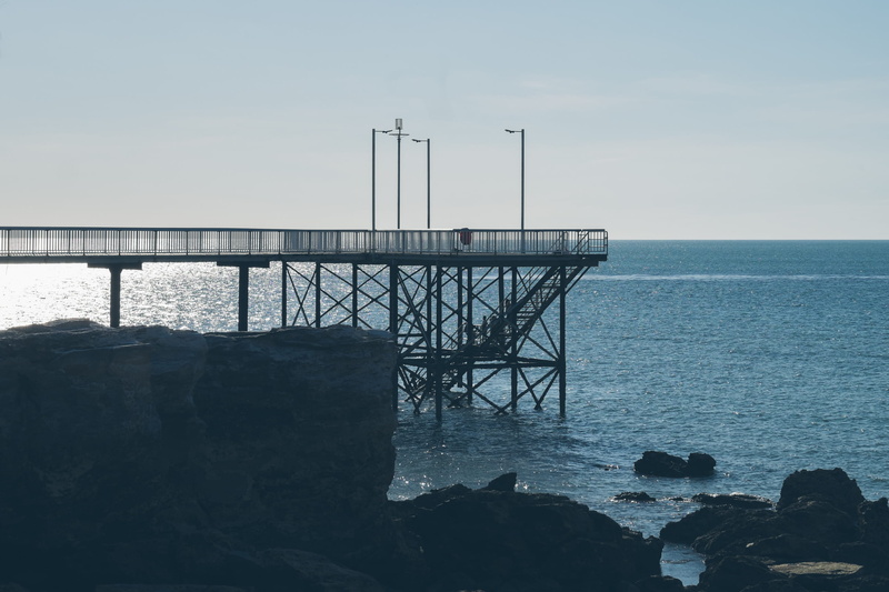 water, coast, beauty in nature, built structure, rock formation, sky, sea, non-urban scene, 2K, darwin, tranquility, scenics - nature, jetty, nature, architecture