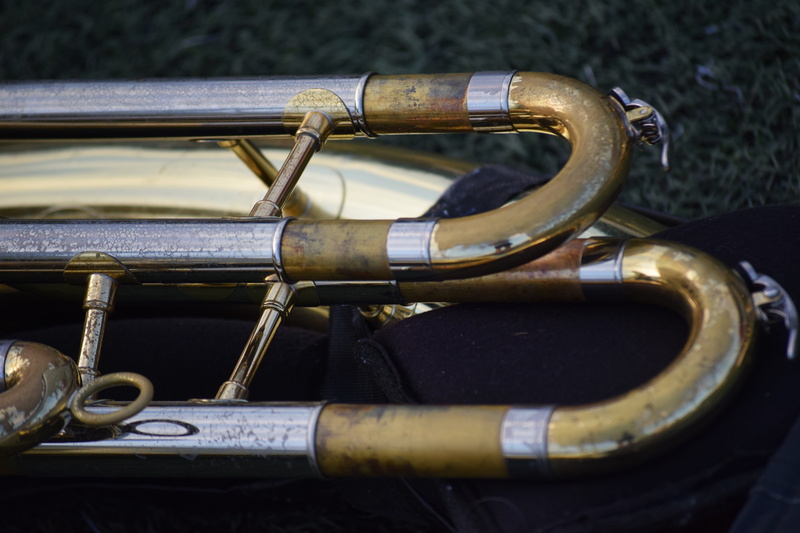metal, old, brass-wind, outdoors, band, gold, field, wind instrument, marching, close-up, musical equipment, tuba, brass instrument, grass, no people, musical instrument