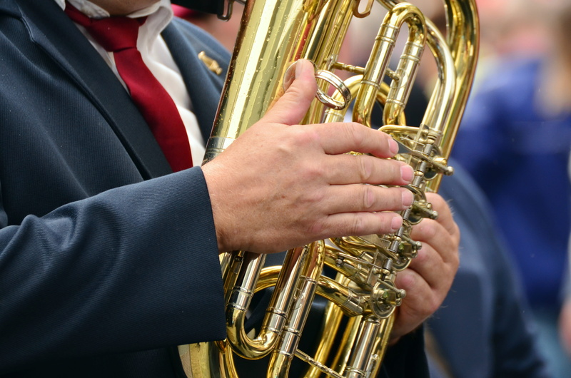 gold colored, performance, brass, Musical Instrument, wind instrument, playing, focus on foreground, real people, sheet, artist, hand, customs, skill, human hand
