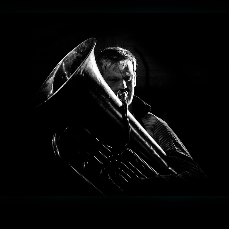 music, portrait, player, sitting, black background, front view, men, contemplation, musician, performance, entertainment, mature adult, senior men, males