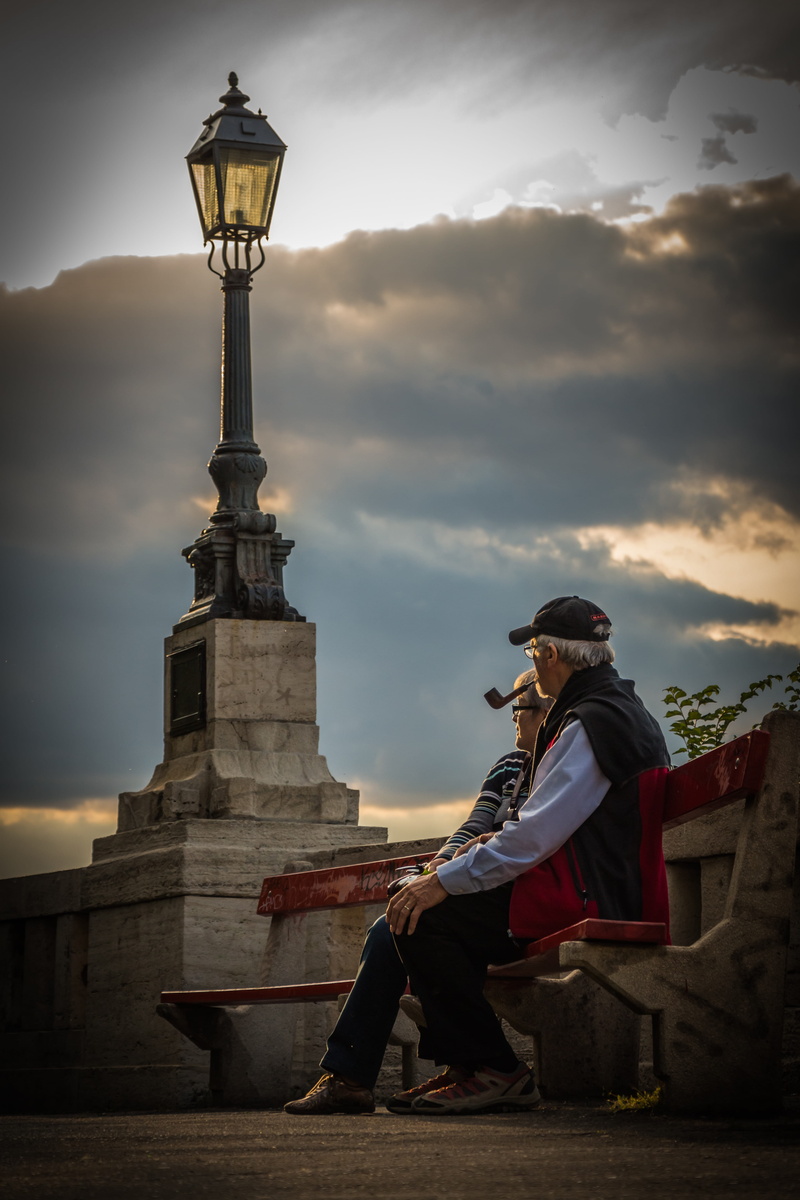 rest, the past, outdoors, built structure, one person, budapest, recreation, sitting, history, elderly couple, lamp, bench, real people, travel destinations