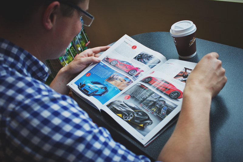 magazine, relaxation, holding, print, 5K, drink, sitting, reading, technology, gingham, activity, adult, leisure activity, casual clothing, white, men