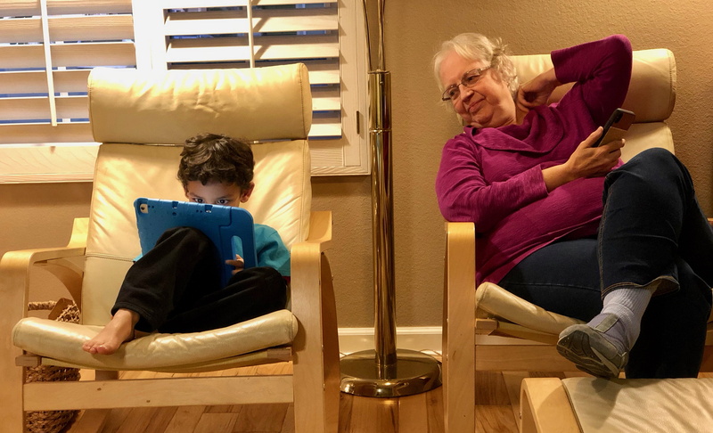 full length, leisure activity, screen time, boys, lifestyles, grandma, boy, relaxation, togetherness, casual clothing, child, ipad, grandfather, adult
