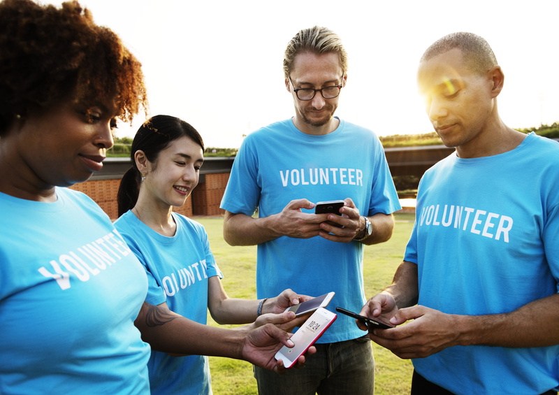 adult, diverse, moral, women, volunteer, wireless technology, digital device, cheerful, charity, charity and relief work, community service, asian, responsibility