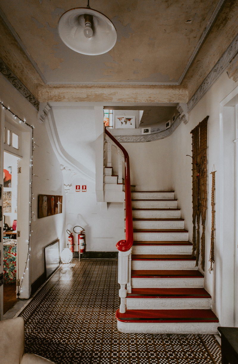 hall, living room, hostel guanaaní, vitoria, wood, 5K, abstract, interior design, lighting equipment, day, red, banister, empty, hardwood, books, entrance