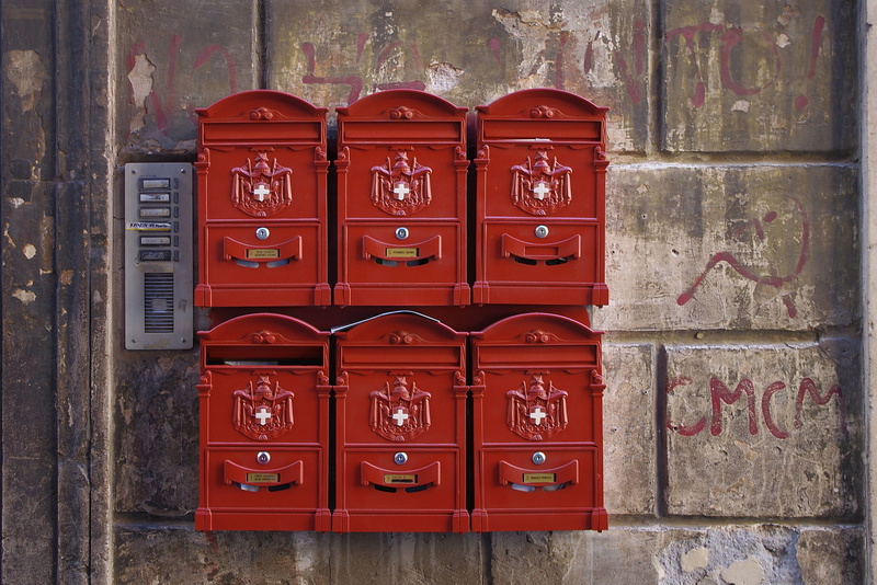wood - material, building exterior, newspaper, metal, red, no people, security, building, mailbox, protection, italy, communication, freud, postman, safety