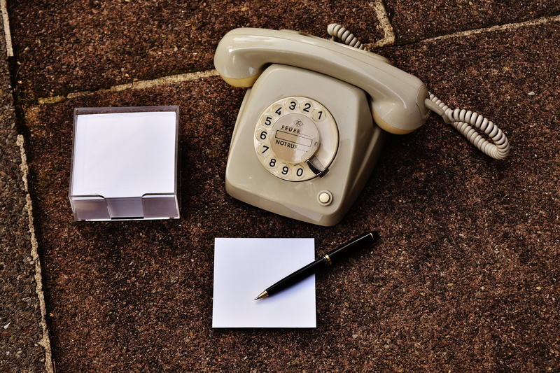 beige, twist, communication, phone, indoors, notes, high angle view, telephone receiver, telephone handset, grey, list, old phone, stickies, table, directly above