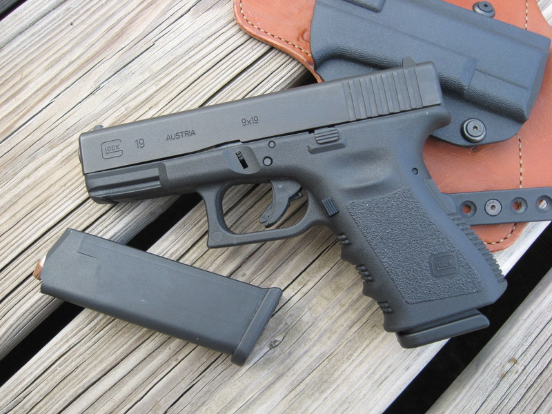 security, still life, weapon, 720P, handgun, social issues, wood - material, gun, communication, indoors, ammunition, crime, no people, Glock Pistol, brown