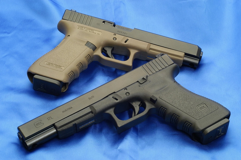 handgun, aggression, Glock Pistol, gun, law, communication, social issues, government, studio shot, still life, justice - concept, no people, Weapons, authority