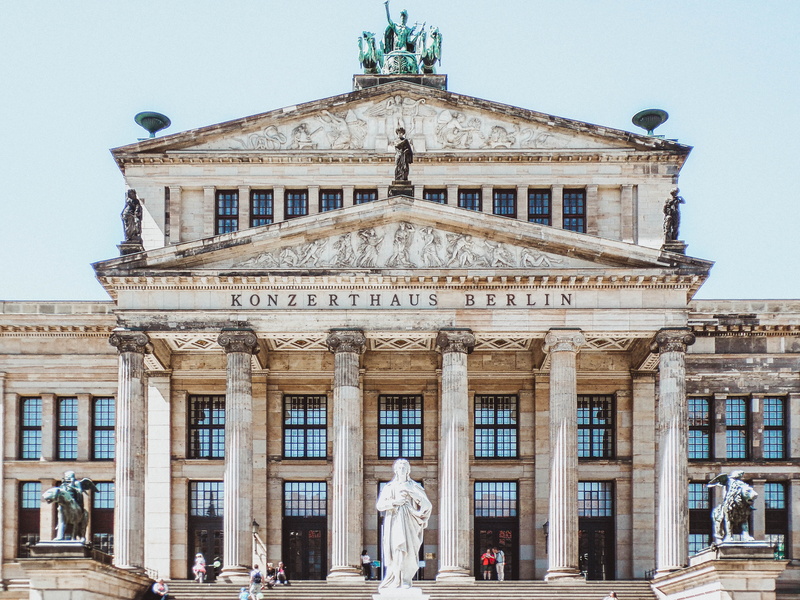 building exterior, landmark, statues, monument, history, sculptures, travel destinations, incidental people, human representation, sky, art and craft, nature