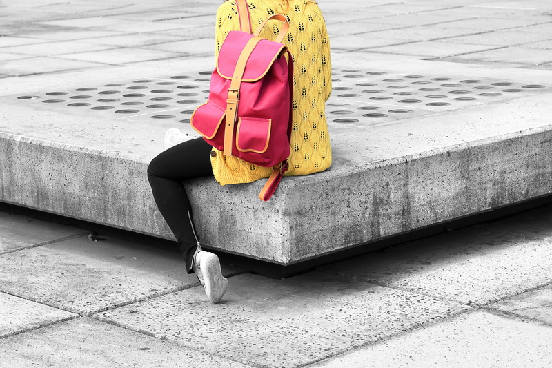 human body part, surface, backpack, 5K, red, woman, gray, selective, low section, urban, close-up, footpath, shirt, high angle view, sitting, photo, pink