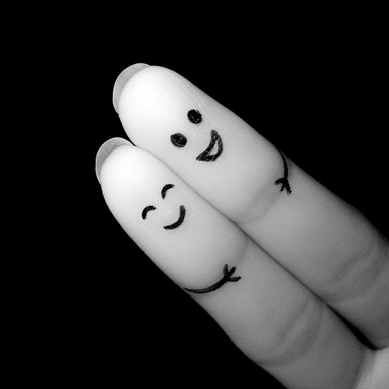 hand, human hand, white, black, anthropomorphic smiley face, anthropomorphic, one person, human body part, studio shot, art and craft, close-up, finger