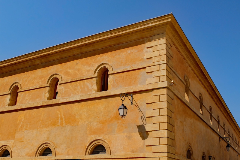 travel destinations, aix-en-provence, city, justice, clear sky, france, building, europe, sky, outdoors, sunny, house, low angle view, arch, ancient, built structure
